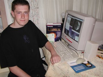 picture, Cory with his computer.