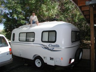 Matthew cleaning the trailer.